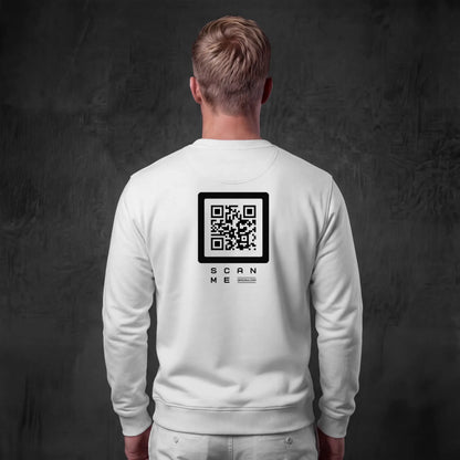 Man wearing white crewneck with Black QR code on back