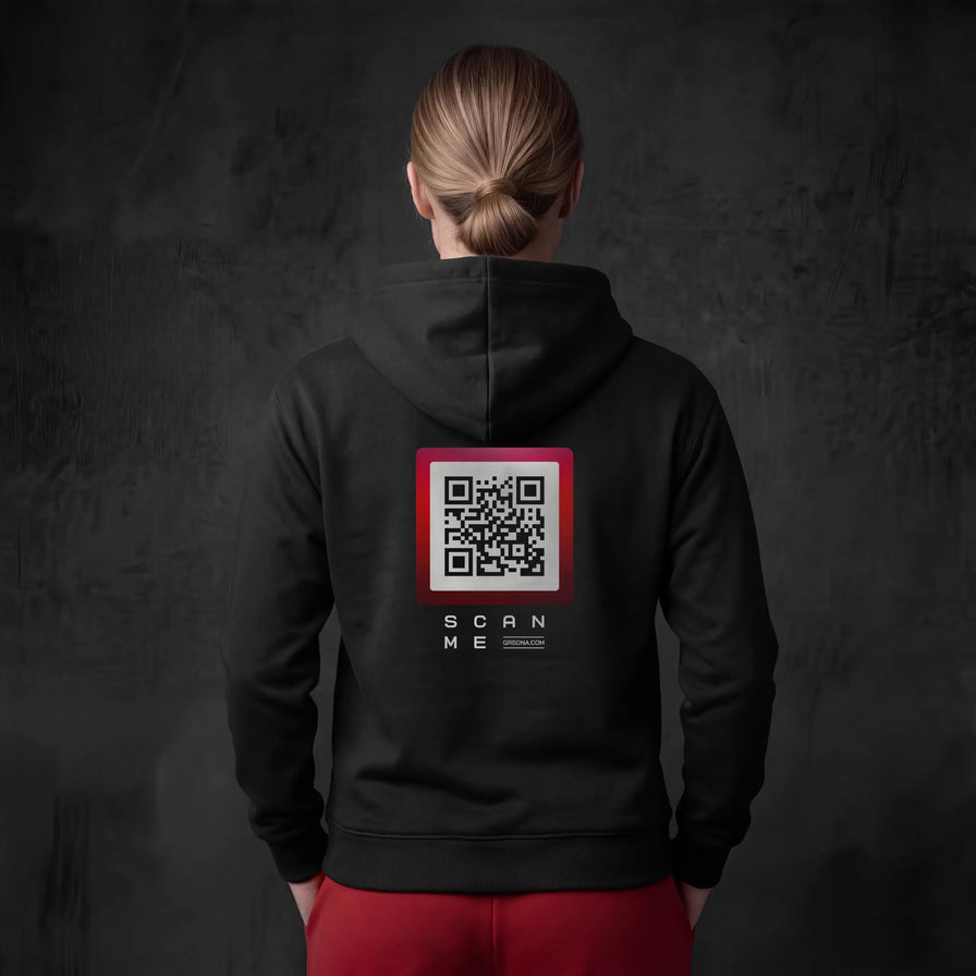 Woman wearing black hoodie with qr code on back