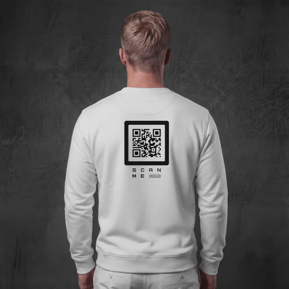 Video of man wearing white crewneck with purple QR code