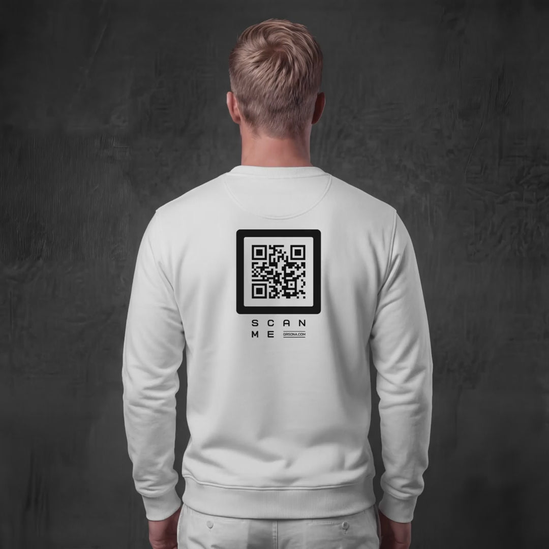 Video of man wearing white crewneck with purple QR code